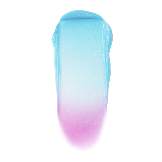 Crowd Favorite ColourPop Cream Blush swatch smeared in a single stroke, fading from icy aqua blue to lilac pink with a dewy sheen, shown against a clean white background.