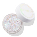 Disco Lady ColourPop Glitter Gel jar sits open, revealing opalescent, chunky glitter suspended in a clear base, while the white cap printed “Glitterally Obsessed” rests ajar on a clean white studio background.