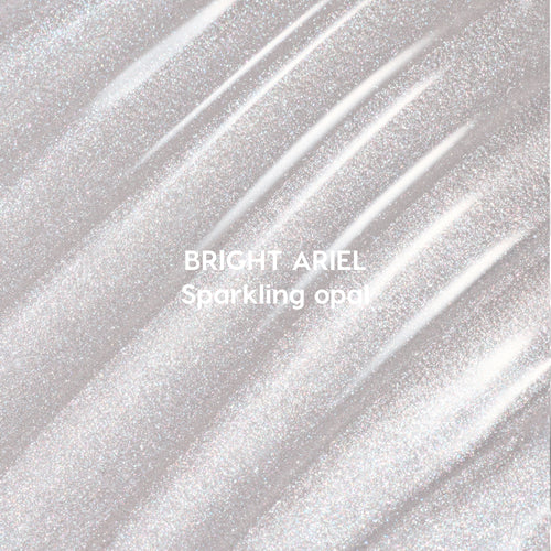 Bright Ariel Ultra Glossy Lip swatch showing shimmering sparkling opal gloss in wavy strokes against a light background, highlighting high-shine Disney Princess inspired lip color texture for US makeup lovers.