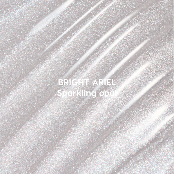 Bright Ariel Ultra Glossy Lip swatch showing shimmering sparkling opal gloss in wavy strokes against a light background, highlighting high-shine Disney Princess inspired lip color texture for US makeup lovers.