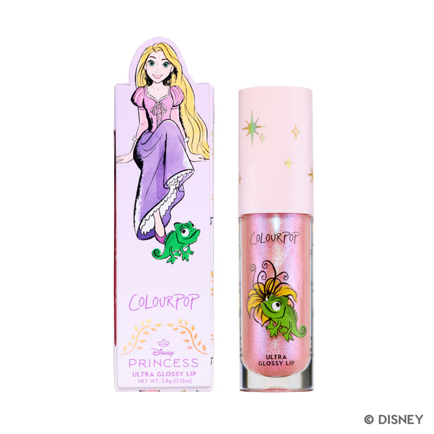 ColourPop Courageous Rapunzel Ultra Glossy Lip tube standing beside its pastel box featuring Disney Princess Rapunzel and Pascal, showing shimmery pink gloss packaging on a white background for a cute makeup look.