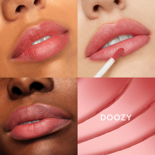 Lips wearing ColourPop Doozy Ultra Blotted Lip apply a soft rosy pink blotted-matte tint, shown across multiple skin tones in a four-panel grid with a doe-foot applicator and smooth swatch ribbons highlighting the shade payoff.