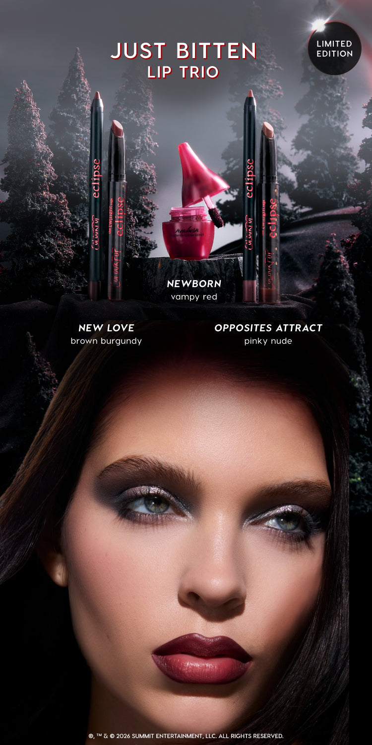 Limited edition Just Bitten Lip Trio makeup set featuring Eclipse-branded lip pencils and gloss in Newborn vampy red, New Love brown burgundy, and Opposites Attract pinky nude, shown above a model wearing dramatic smoky eye and deep red ombré lips in a dark forest scene.