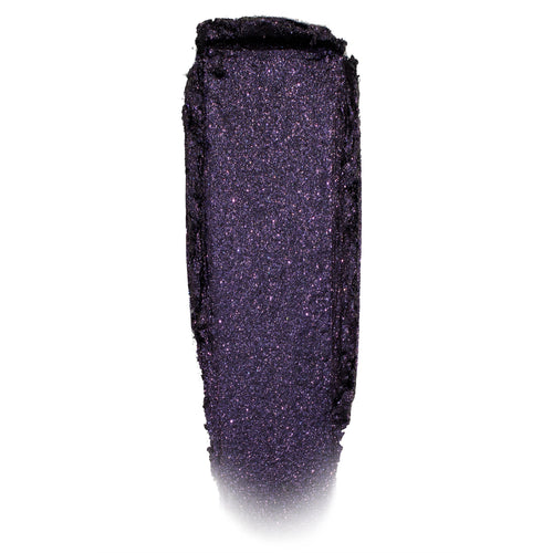 Deep violet-black, glittery eyeshadow swatch shimmering in a single swipe on a white background; Emo Inside Jelly Much Shadow by ColourPop, highlighting fine purple sparkle and the long-wear jelly texture of ColourPop Jelly Much Shadow.