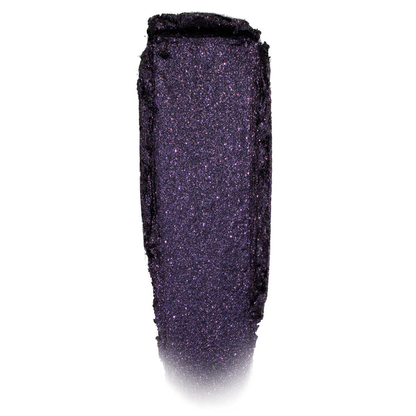 Deep violet-black, glittery eyeshadow swatch shimmering in a single swipe on a white background; Emo Inside Jelly Much Shadow by ColourPop, highlighting fine purple sparkle and the long-wear jelly texture of ColourPop Jelly Much Shadow.