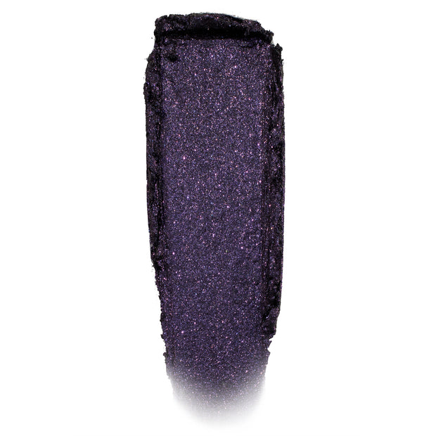 Deep violet-black, glittery eyeshadow swatch shimmering in a single swipe on a white background; Emo Inside Jelly Much Shadow by ColourPop, highlighting fine purple sparkle and the long-wear jelly texture of ColourPop Jelly Much Shadow.