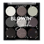 Blowin’ Smoke shadow palette showcasing nine cool‑toned shades - white, silver, graphite, and black - in matte, shimmer, and glitter finishes arranged 3x3 in a black compact with clear lid; ColourPop Shadow Palette for bold smoky eyes.
