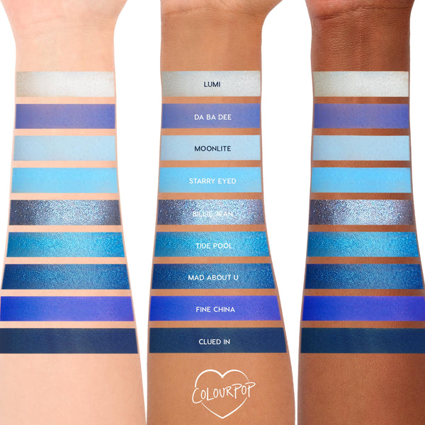 Blue Moon shadow palette swatches line three skin tones, showcasing icy silver to deep navy blues in matte and shimmer; shades labeled Lumi, Da Ba Dee, Moonlite, Starry Eyed, Billie Jean, Tide Pool, Mad About U, Fine China, Clued In from ColourPop Shadow Palette.
