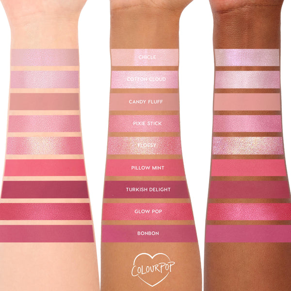 Cloud Spun ColourPop Shadow Palette swatches - nine pink shades (Chicle, Cotton Cloud, Candy Fluff, Pixie Stick, Flossy, Pillow Mint, Turkish Delight, Glow Pop, Bonbon) - shown as matte and shimmer stripes on light, medium, and deep arms.
