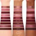 ColourPop Wine and Only shadow palette swatches stripe three arms - light, medium, and deep skin - showing matte and shimmer wine tones from rosé to merlot and plum, featuring shades like Blanc, Sip Sip, Major Chianti, Mon Sherry, and Grape-ful.