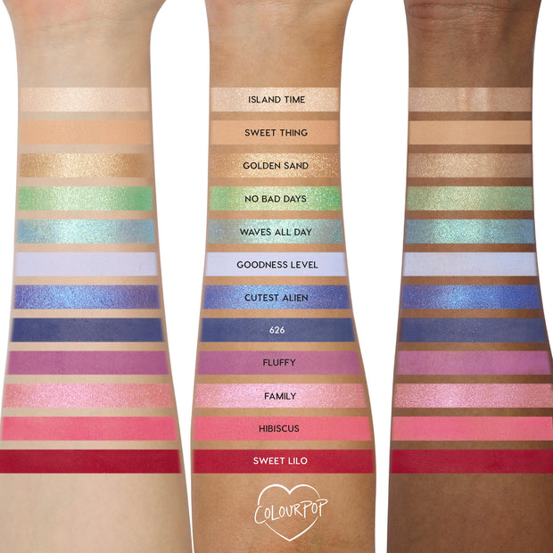 ColourPop Disney Lilo and Stitch Collection full collection set arm swatches displaying 12 eyeshadow shades - nudes, greens, teals, blues, purples, pinks, coral, and red - in matte and shimmer, labeled on three skin tones.
