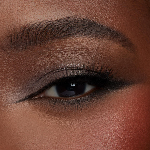 Smoky neutral eye wearing Brewtiful Neutrals from the ColourPop Shadow Palette Set, with taupe matte crease, subtle silver shimmer on the lid, diffused black liner, and full lashes, shown in a tight macro to highlight blend and payoff.