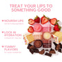 Vanilla Cake ColourPop Lip Scrub shown open with sugar crystals, arranged beside Strawberry Milk and Chocolate Milkshake scrubs, while sliced strawberries, funfetti cake, and dark chocolate pieces frame the set to suggest sweet, hydrating lip care.