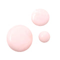 Strawberry Face Milk swatches pooling as three glossy, light pink droplets on a white background, showcasing the creamy texture and dewy finish of the ColourPop Face Milk.