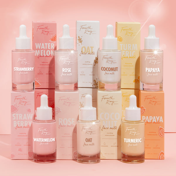 Fourth Ray Beauty Colourpop face milks arranged in a pastel pink display, showing fruity and oat moisturizing serums in glass dropper bottles, highlighting the Matcha-style skincare vibe for US beauty lovers.