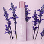 A-List Babe Youth-Boosting Serum Stick by Fourth Ray Beauty from the Best Face Scenario ColourPop Face Set stands open with dewy droplets, surrounded by lavender sprigs on a soft purple backdrop.