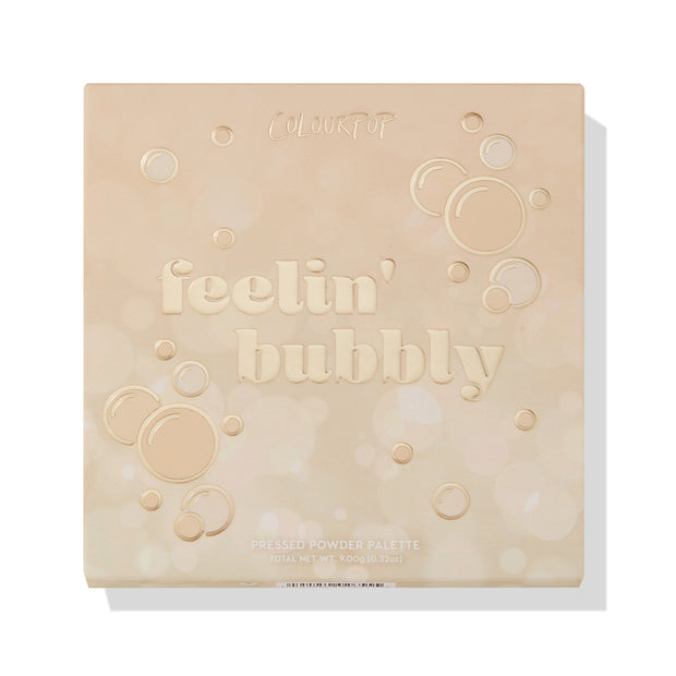 ColourPop Feelin’ Bubbly Shadow Palette shown closed, champagne-beige compact with embossed bubbles and raised “feelin’ bubbly” text; pressed powder palette 9.00g (0.32oz) on a clean white studio background.
