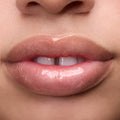 Close-up of models’ lips wearing Colourpop Fresh Kiss Glossy Balm in Buttery Pancakes, showing sheer pink shimmer Lip Gloss & Lip Oil finish on different skin tones against a plain background.