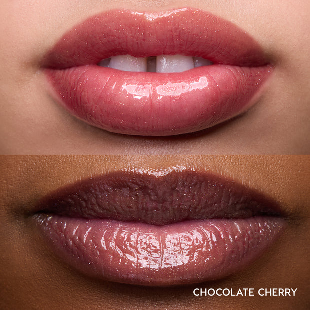 Close-up swatches of Colourpop Fresh Kiss Glossy Balm in Chocolate Cherry on two lip tones, showing sheer berry shine with subtle shimmer, promoting Lip Gloss & Lip Oil finish and smooth, hydrated lips.