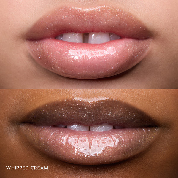 Close-up of two models’ lips wearing Colourpop Fresh Kiss Glossy Balm in Whipped Cream, showing sheer nude shine and shimmer finish, highlighting Lip Gloss & Lip Oil texture on different skin tones against a plain background.