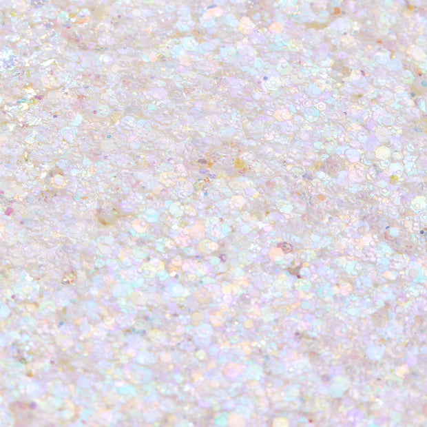 Disco Lady Glitter Gel shimmering in a close-up swatch, iridescent opal hex and micro glitter suspended in clear gel reflecting pastel rainbow hues; macro texture for ColourPop Glitter Gel product photography.