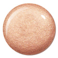Venice Blvd swatch shimmering in a glossy, circular pool, showing a warm peachy‑champagne glow with fine gold shimmer; ColourPop Liquid Highlighter texture and finish displayed in close-up on a clean white background.