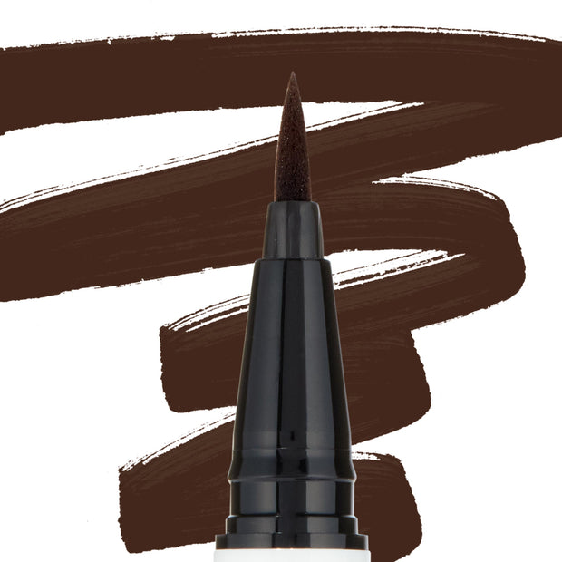 Felt-tip applicator of the Grande BFF Liquid Liner laying down bold chocolate-brown swipes on a white backdrop, emphasizing the precise brush tip and opaque color; ColourPop BFF Liquid Liner product close-up.