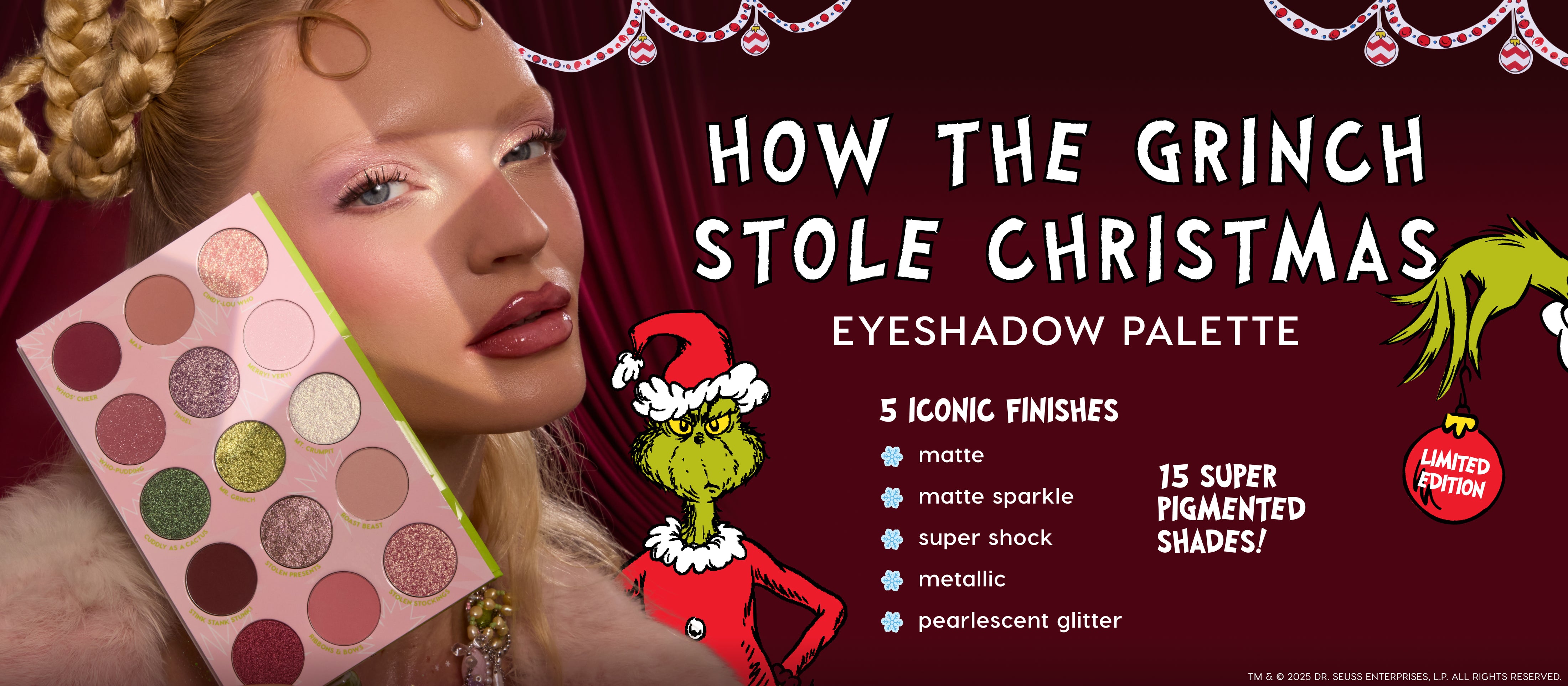 ColourPop How the Grinch Stole Christmas eyeshadow palette held beside a model’s face, showing 15 super‑pigmented pinks, mauves, and glittery green in matte, matte sparkle, Super Shock, metallic, and pearlescent glitter; holiday limited edition with The Grinch.