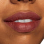 Lips wearing a deep mauve-brown, creamy matte line and fill, showcasing the ColourPop Lippie Pencil in Grunge; close-up beauty swatch with slightly parted lips highlighting precise edges and smooth, full-coverage color payoff.
