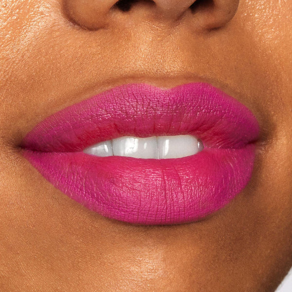 Lips wearing Heart On, a ColourPop Lippie Pencil, displaying rich fuchsia-magenta color with crisp, even lines and a satin-matte finish in a close-up beauty swatch.
