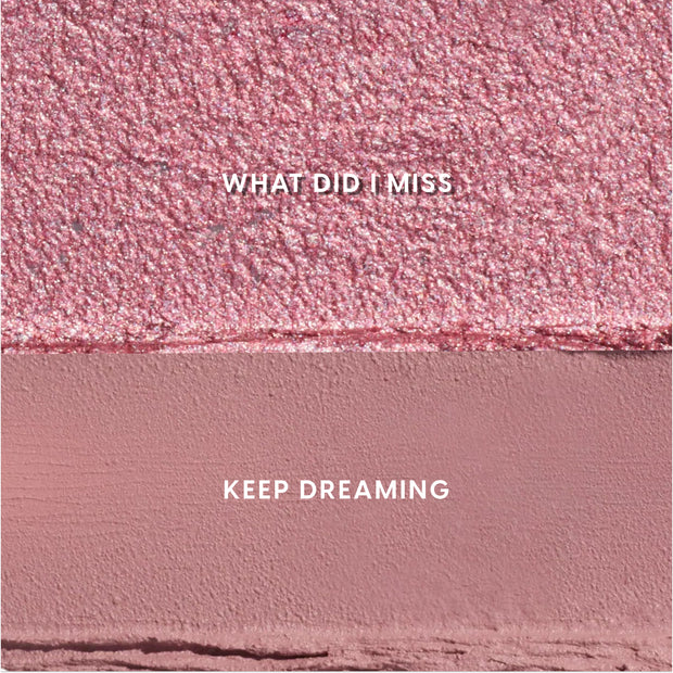 Heart to Get Love At First Swipe Shadow Stix swatches showing two pink shades, a shimmering rose labeled “What Did I Miss” above a matte mauve labeled “Keep Dreaming,” displayed in a close-up textured grid for US makeup shoppers.