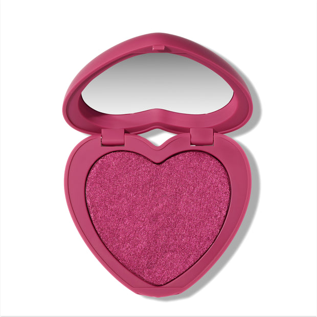 Heart to Get Cuter than Cupid Super Shock Blush compact showing a shimmery hot pink heart-shaped blush pan inside a matching heart case with mirror, styled on a clean white background for US makeup lovers