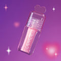 ColourPop 2 Die 4 Ultra Glossy Lip in a clear tube with pink shimmer gloss and heart-shaped cap floating against a dreamy purple Heart to Get themed background with soft sparkles.