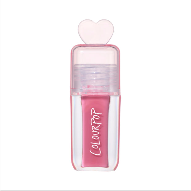 ColourPop Your New Obsession ultra glossy lip in the Heart to Get shade standing upright on a white background, featuring a clear pink tube with bold white logo and a translucent heart-shaped cap for a cute, high-shine lip gloss look.
