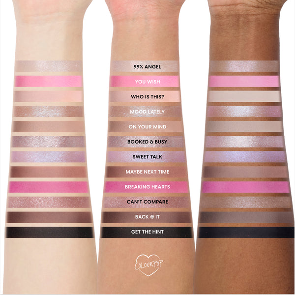 Heart to Get Full Collection swatched on three arms of different skin tones, showing the full collection set of pink, nude, brown, shimmer, and black shades labeled from 99% Angel to Get the Hint for Heart to Get makeup buyers.