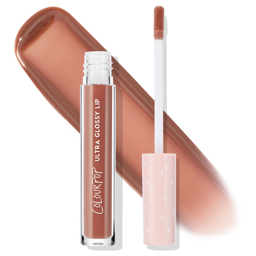 ColourPop Ultra Glossy Lip in Hit Snooze displayed open, clear tube beside doe-foot applicator with blush pink star cap, set over a wide warm caramel-nude swatch showcasing a high-shine finish for everyday lip gloss wear.