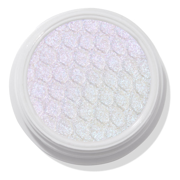 Ice Dream ColourPop Super Shock Shadow, a bouncy cream-to-powder eyeshadow, glistening with icy iridescent white-lavender shimmer, pressed in a honeycomb texture and housed in a round white pot on a clean studio background.