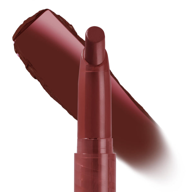 ColourPop Lippie Stix Infinite Best standing uncapped, displaying its rounded tip as a deep burgundy-brown swatch sweeps behind, showcasing creamy pigment payoff on a clean white background.