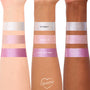 ColourPop Jelly Much Shadow Play All Day swatches coat three forearms in gleaming shades - icy silver (It’s Forky!), petal pink (Hamm It Up), and orchid purple (Beary Good Vibes) - shown on light, medium, and deep skin tones against a white backdrop.