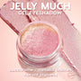 ColourPop Jelly Much Shadow Duckling shows an open pot of pink-to-gold duochrome metallic gel eyeshadow, its sparkly formula swatched in wide strokes behind the jar on a pink backdrop, highlighting vibrant pigment in a promo graphic.