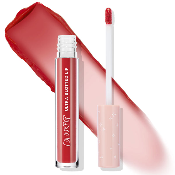 ColourPop Ultra Blotted Lip in Keep It Classy shown with cap off as the doe-foot applicator displays a rosy-red swatch with a soft, blurred finish; clear tube and peach cap with white stars on a clean white background.