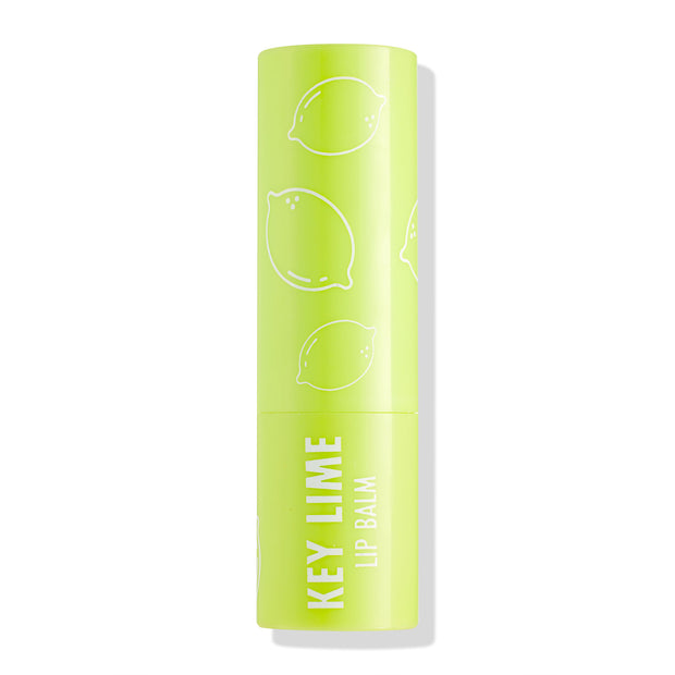 ColourPop Lip Balm tube in Key Lime standing upright with cap on, showcasing a bright lime‑green case with white lime illustrations and “KEY LIME LIP BALM” text, photographed isolated against a clean white background.