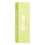 Key Lime Lip Scrub box stands upright, showing Fourth Ray Beauty branding, lime illustrations, and bold “KEY LIME” text on pastel lime‑green packaging, 4.0 g (0.14 oz), isolated on white; a ColourPop lip care product.
