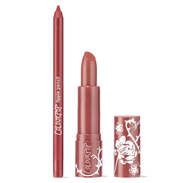 Anti-Hero ColourPop Lux Lipstick standing uncapped beside a matching lippie pencil, both in a rosy mauve tone; the lipstick’s floral-printed tube and cap rest on a clean white background, highlighting the bullet and precise liner for a coordinated lip look.