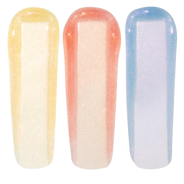 Evolution Ultra Glossy Lip swatches display three iridescent ColourPop Ultra Glossy Lip strokes - golden pearl, peachy pink, and icy blue‑lilac - shimmering with micro‑glitter to show a sheer high‑shine finish on a white background.