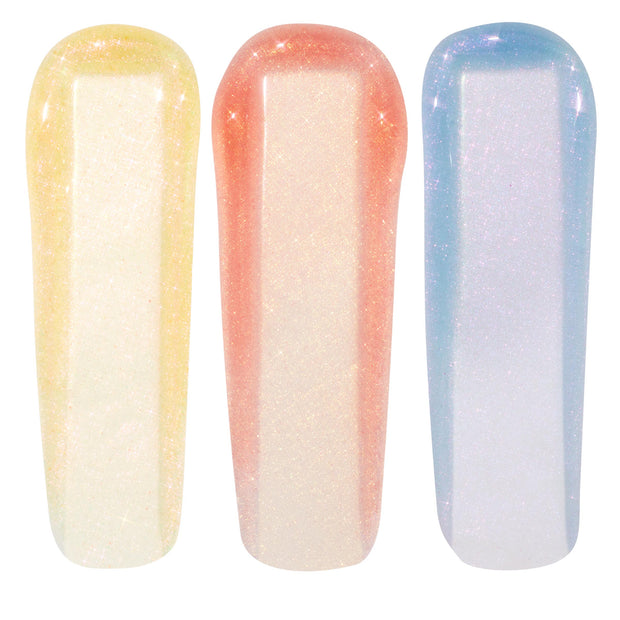 Evolution Ultra Glossy Lip swatches display three iridescent ColourPop Ultra Glossy Lip strokes - golden pearl, peachy pink, and icy blue‑lilac - shimmering with micro‑glitter to show a sheer high‑shine finish on a white background.