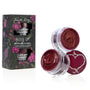 Kiss of Darkness lip care kit by Fourth Ray Beauty, a ColourPop Lip Care Kit, shown with two open mini jars - sparkly berry lip scrub and glossy overnight lip mask - beside a black floral box labeled Chocolate Covered Strawberry.