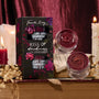 Kiss of Darkness ColourPop Lip Care Kit showcasing Fourth Ray Beauty duo - Chocolate Covered Strawberry lip scrub and overnight lip mask - opened in glass jars beside the floral black box, styled on vintage books with candles and dried flowers.