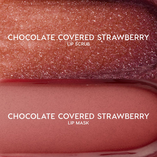 Chocolate Covered Strawberry lip scrub and lip mask swatches gleam in two horizontal bands, showcasing the Kiss of Darkness ColourPop Lip Care Kit with a sparkly rosy-brown sugar scrub and a smooth creamy pink mask in a studio close-up.