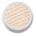 ColourPop Ladybird Super Shock Shadow glistening in a close-up, champagne beige ultra-glitter formula pressed with a scalloped cushion texture and packed in a round white pot, catching light for a high-shine metallic finish on a clean studio background.